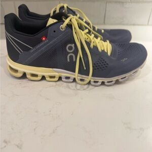 On Running Yellow and Gray Athletic Shoes with Cloud Cushioning